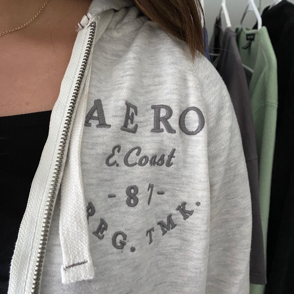 grey zip up jacket